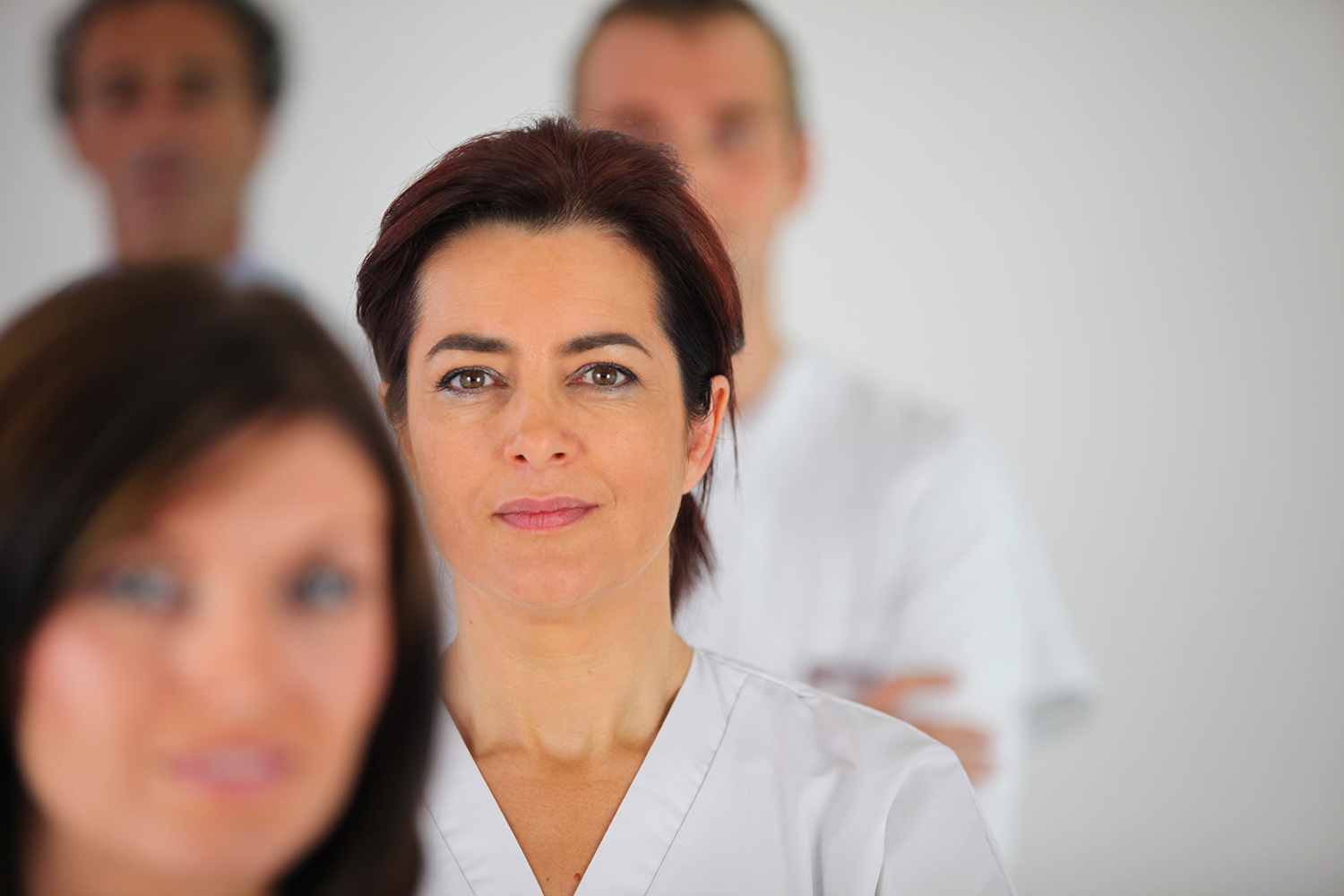 healthcare professional in white scrubs 